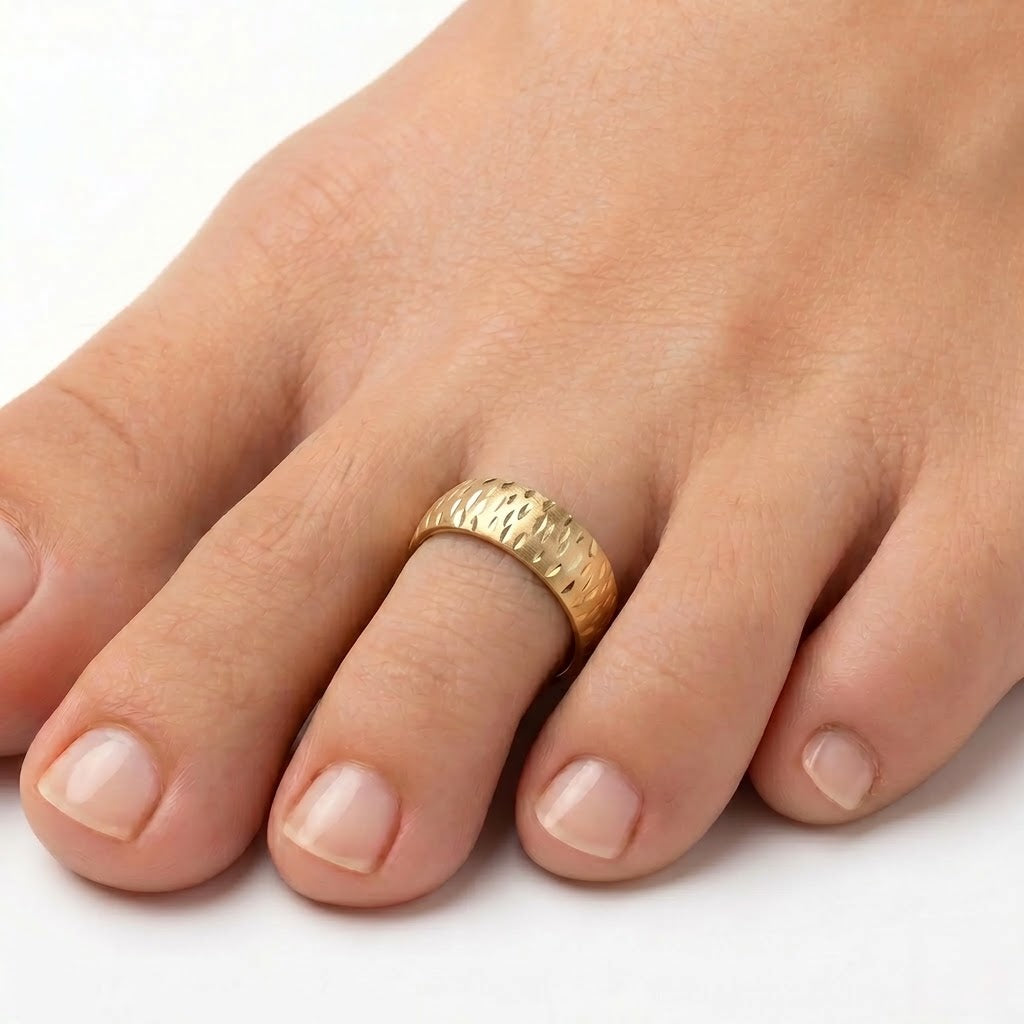 10K solid yellow gold marquise diamond-cut toe ring worn on foot
