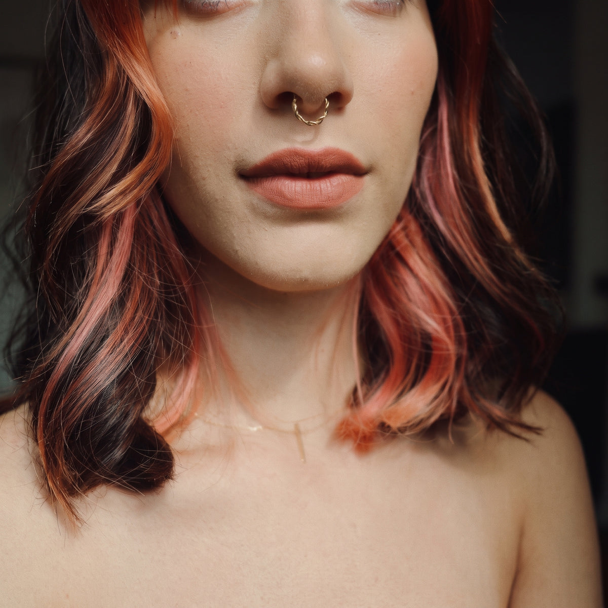 10K solid gold braided clicker hoop lifestyle photo